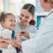 young girl at the doctor with her mother getting a shot, supporting immunization awareness month